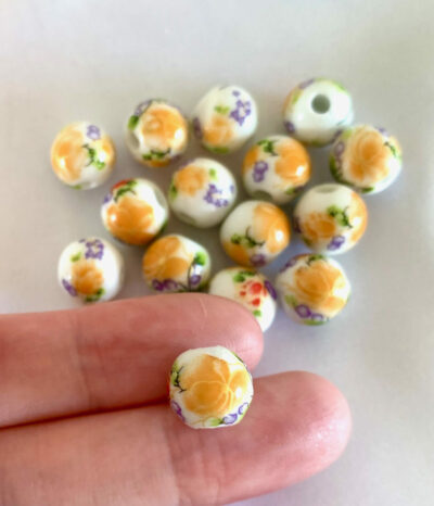 CLOSEUP_10mm Orange Flower Round Ceramic Bead