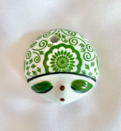 Hand Painted Green Doll Face with Floral Folk Art Motif Focal Round Ceramic Pendant